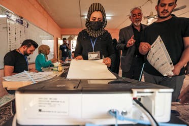 من مركز اقتراع في بغداد (أرشيفية من فرانس برس)