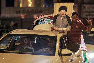 انصار زعيم التيار الصدري يحتفلون في بغداد (فرانس برس)