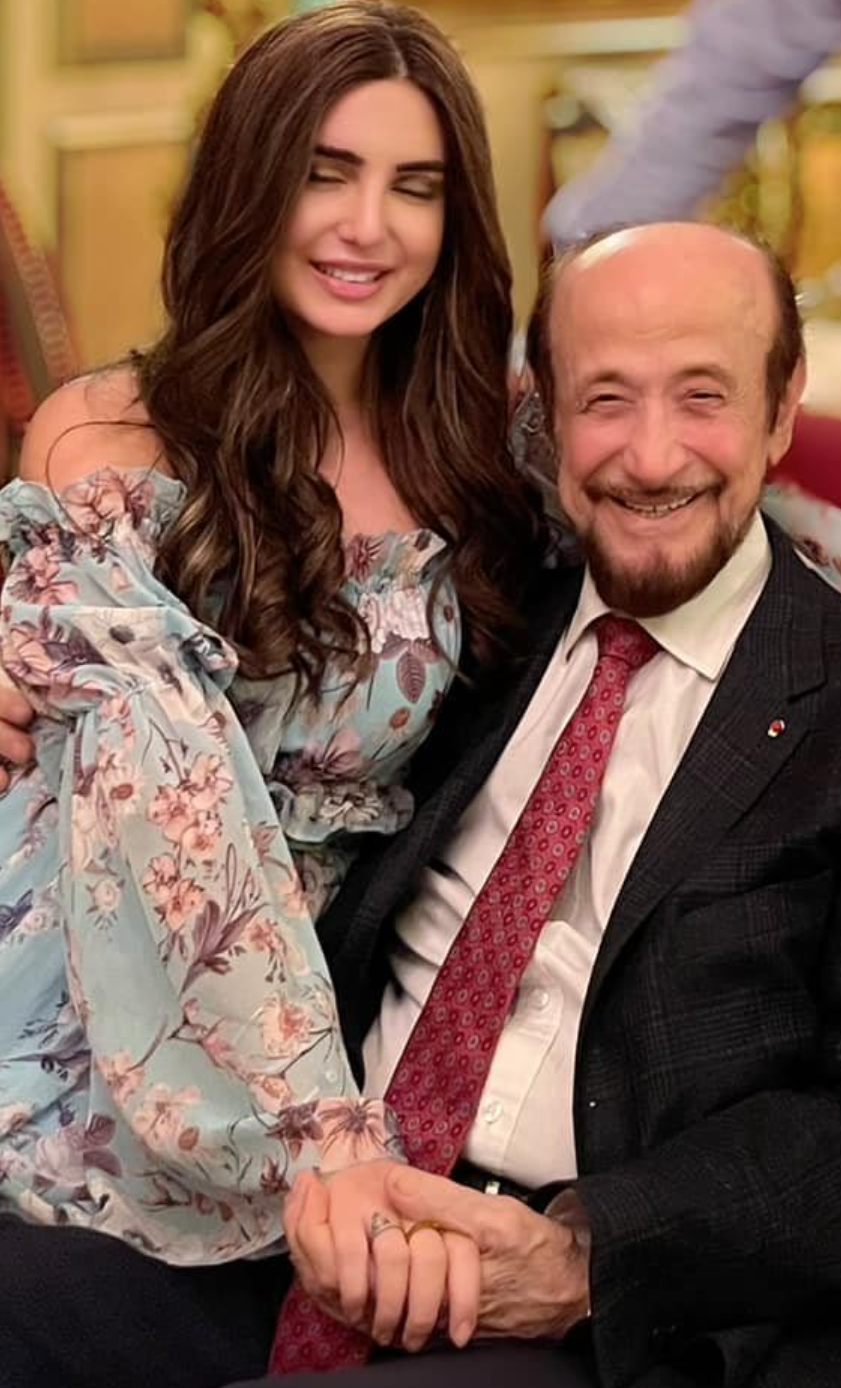 Rifat al-Assad with one of his granddaughters