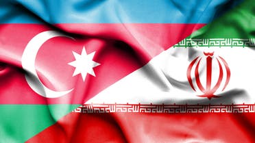 Waving flag of Iran and Azerbaijan stock photo