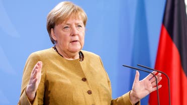 German Chancellor Angela Merkel addresses the media during a statement following an online G20 summit on the current situation in Afghanistan, in Berlin, Germany, on October 12,2021. (Reuters)