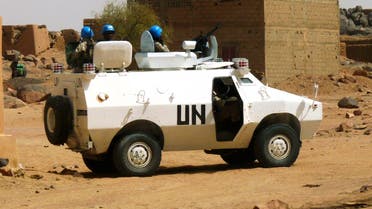 UN peacekeepers patrol in the northern town of Kidal, July 17, 2013. Mali's government accused northern Tuareg separatists on Saturday of violating a ceasefire deal signed last month after 4 people were killed in ethnic violence in the northern town of Kidal, a week ahead of elections. Picture taken July 17, 2013. REUTERS/Stringer (MALI - Tags: CIVIL UNREST ELECTIONS POLITICS)