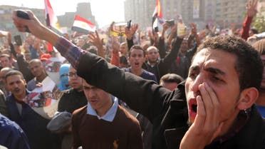 Supporters of the Muslim Brotherhood and ousted Egyptian President Mohamed Mursi shout slogans against the military and the interior ministry during a protest in Cairo November 28, 2014. (File photo: Reuters)