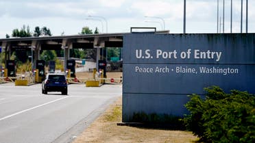 A single vehicle heads into the U.S. at the quiet Peace Arch border crossing Monday, Aug. 9, 2021, in Blaine, Wash. (AP)