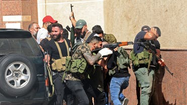 عناصر من حزب الله وحركة أمل في طيونة خلال اشتباكات بيروت  - 14 اكتوبر 2021 - فرانس برس