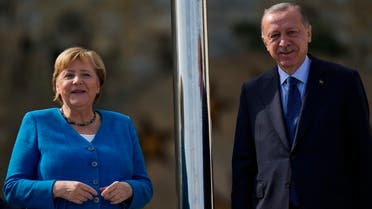 German Chancellor Angela Merkel talks to Turkish President Recep Tayyip Erdogan on the occasion of their meeting at Huber Villa presidential palace, in Istanbul, Turkey, on Oct. 16, 2021. (AP)