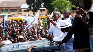 Opposition leader Martin Fayulu, addresses a crowd of his supporters during a demonstration over the independence of the country’s electoral commission, in Kinshasa, Democratic Republic of Congo, October 16, 2021. (Reuters)