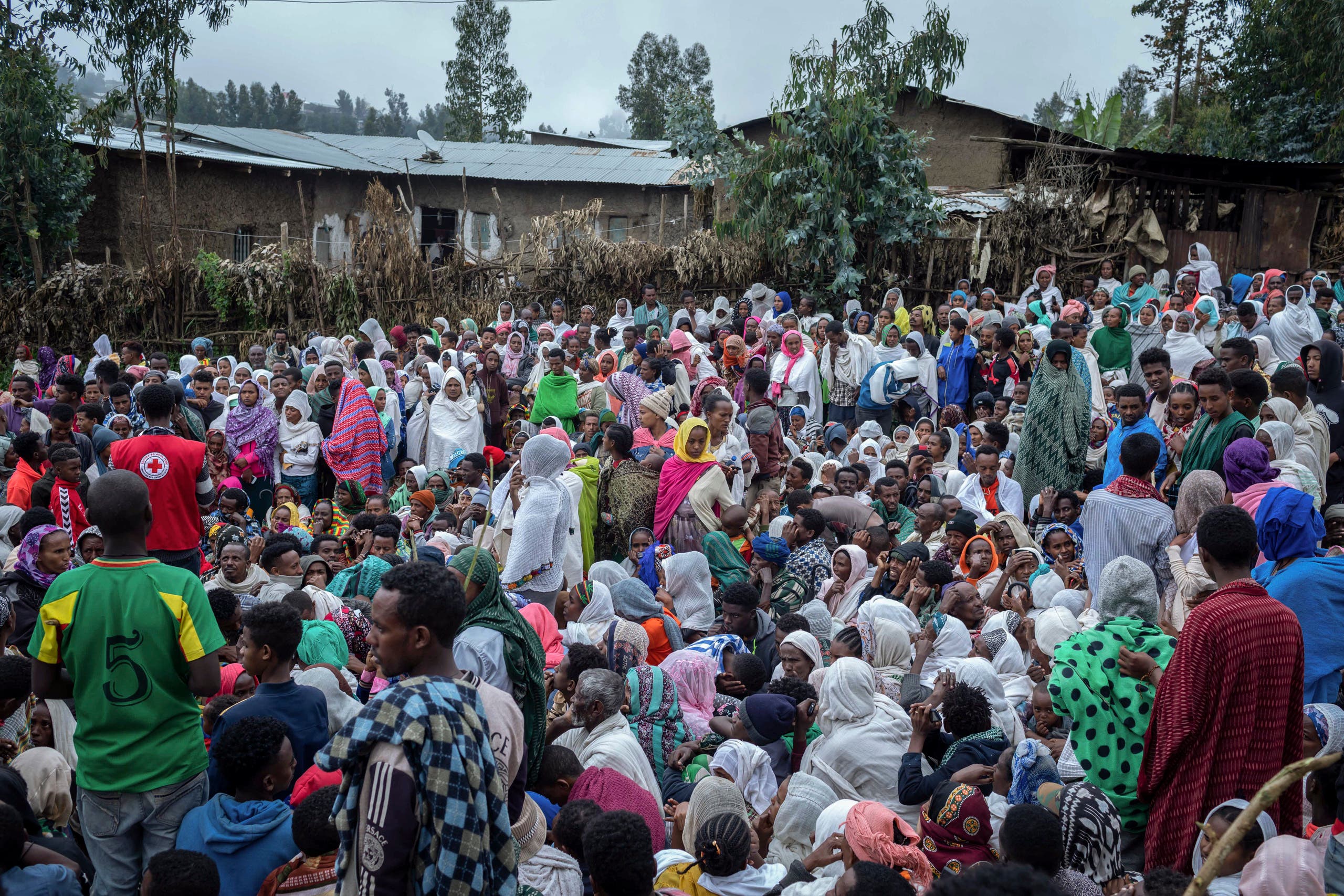 Displaced Ethiopians from different towns in the Amhara region wait for aid distributions at a center for the internally-displaced in Debark, in the Amhara region of northern Ethiopia Friday, Aug. 27, 2021. (AP)