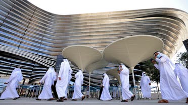isitors walk outside the Sustainability pavilion at the Expo 2020 in the Gulf Emirate of Dubai on October 6, 2021. (AFP)