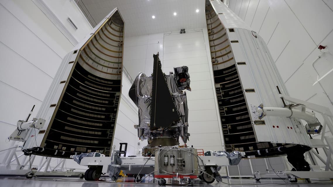 NASA's Lucy spacecraft is shown as it is prepared for launch in October aboard a United Launch Alliance Atlas 5 rocket, in Titusville, Florida, U.S. September 29, 2021. Lucy will fly by seven Trojan asteroids, a unique family of asteroids that orbit the sun in front of and behind Jupiter. REUTERS/Joe Skipper