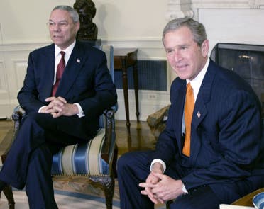 US President George W. Bush and Secretary of State Colin Powell (L) meet in the Oval Office of the White House, April 18, 2002. (Reuters)
