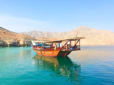 Oman Musandam Dhow boat. (Unsplash, Musandam Dhow Tours)