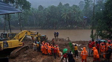 Rescue workers carry the body of a victim after recovering it from the debris of a residential house following a landslide caused by heavy rainfall at Kokkayar village in Idukki district in the southern state of Kerala, India, October 17, 2021. Picture taken October 17, 2021. (File photo: Reuters)