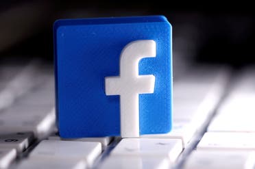 A 3D-printed Facebook logo is seen placed on a keyboard in this illustration taken March 25, 2020. (Reuters)