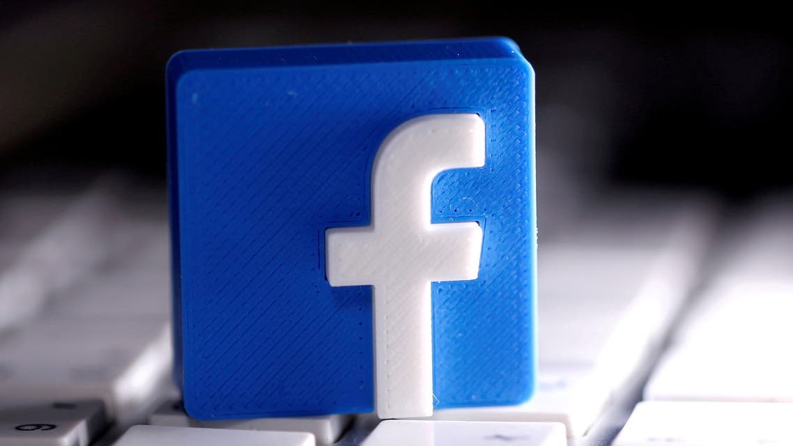 A 3D-printed Facebook logo is seen placed on a keyboard in this illustration taken March 25, 2020. (Reuters)