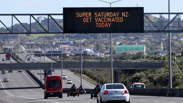 A sign on an Auckland motorway urges people to get vaccinated at a coronavirus disease (COVID-19) vaccination clinic during a single-day vaccination drive, aimed at significantly increasing the percentage of vaccinated people in the country, in Auckland, New Zealand, October 16, 2021. (File photo: Reuters)