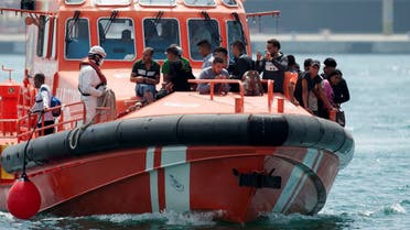 A coastguard vessel arrive at Malaga's harbour with would-be immigrants onboard after being rescued in the waters of the Strait of Gibraltar, on August 18, 2017. (AFP)