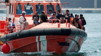 Spain's rescuers search for 12 missing migrants after boat from Algeria overturned