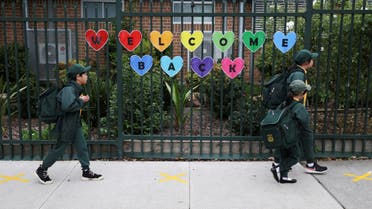 Children return to campus for the first day of New South Wales public schools fully re-opening for all students and staff amidst the easing of the coronavirus disease (COVID-19) restrictions at Homebush West Public School in Sydney, Australia, May 25, 2020. (File photo: Reuters)
