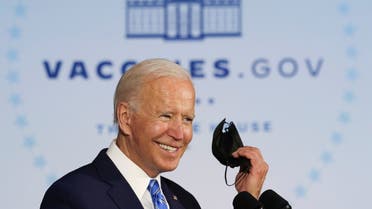 President Joe Biden removes his mask to deliver remarks on the importance of COVID-19 vaccine requirements, Oct. 7, 2021. (Reuters)