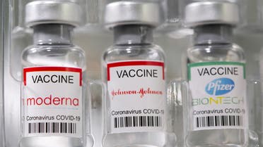 Vials labelled Moderna, Johnson & Johnson, Pfizer-BioNTech coronavirus disease (COVID-19) vaccine are seen in this illustration picture taken May 2, 2021. (Reuters)