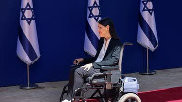 Israeli Minister of Energy Karin Elharrar arrives to the Presiden't residence for a an official photo with the new coalition government, in Jerusalem, on June 14, 2021. (AFP)