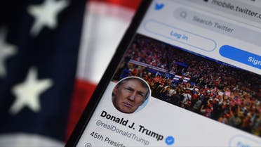 In this file photo illustration taken on August 10, 2020, the Twitter account of US President Donald Trump is displayed on a mobile phone on August 10, 2020, in Arlington, Virginia. (AFP)
