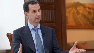 A handout picture released by the official Syrian Arab News Agency (SANA) on March 5, 2020 shows President Bashar al-Assad speaking during an interview with Russia Today in Damascus. (AFP)