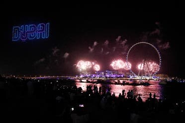 Fireworks explode during the opening ceremony of the Dubai Eye ferris wheel in Dubai, United Arab Emirates, October 21, 2021. (Reuters)
