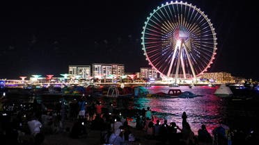 Fireworks explode during the opening ceremony of the Dubai Eye ferris wheel in Dubai, United Arab Emirates, October 21, 2021. (Reuters)