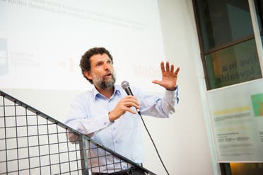 This undated handout photograph released on October 15, 2021, by the Anadolu Culture Center shows Parisian-born Turkish philanthropist Osman Kavala speaking during an event in Istanbul. (AFP)