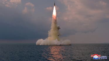 FILE PHOTO: A new submarine-launched ballistic missile is seen during a test in this undated photo released on October 19, 2021 by North Korea's Korean Central News Agency (KCNA). KCNA via REUTERS ATTENTION EDITORS - THIS IMAGE WAS PROVIDED BY A THIRD PARTY. REUTERS IS UNABLE TO INDEPENDENTLY VERIFY THIS IMAGE. NO THIRD PARTY SALES. SOUTH KOREA OUT. NO COMMERCIAL OR EDITORIAL SALES IN SOUTH KOREA./File Photo