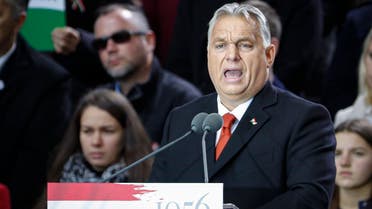 Hungarian Prime Minister Viktor Orban addresses supporters during celebration the 65th anniversary of the 1956 Hungarian revolution, in Budapest, Hungary, on Oct. 23, 2021. (Reuters)