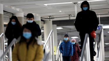 People wearing face masks commute in a subway station during morning rush hour, following the coronavirus outbreak, in Beijing, China. (File photo: Reuters) 