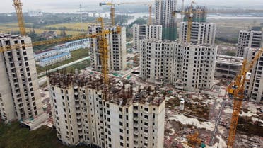 An aerial view shows residential buildings at the construction site of Evergrande Cultural Tourism City, a China Evergrande Group project whose construction has halted, in Suzhou’s Taicang, Jiangsu province, China, on October 22, 2021. (Reuters)