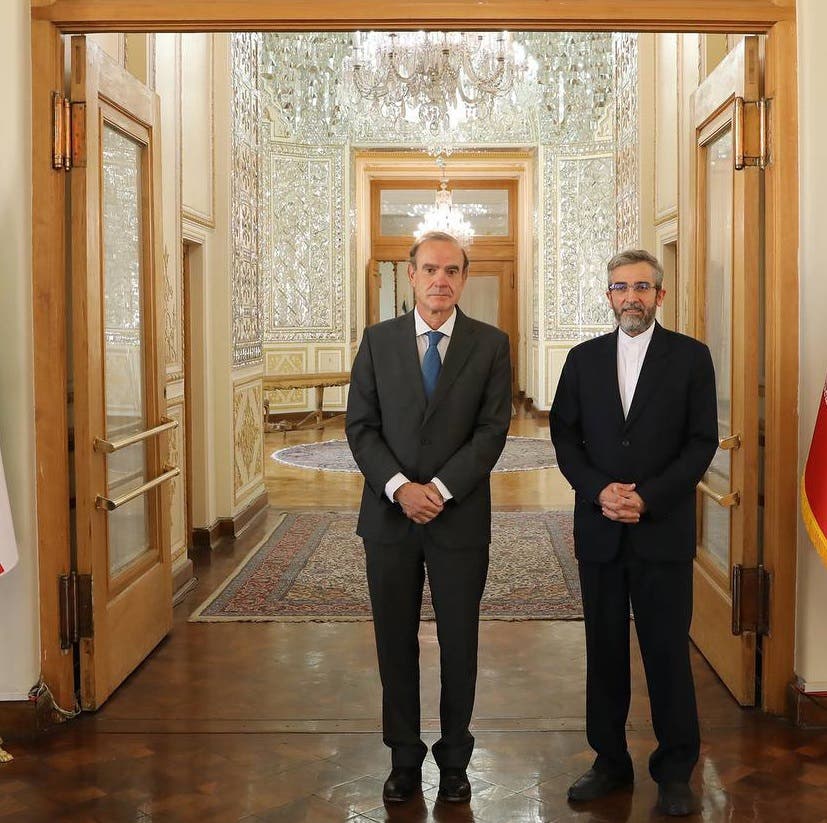 لقاء سابق بين علي باقري وإنريكي مورا في طهران (أرشيفية من فرانس برس)