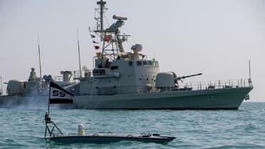 A MANTAS T-12 unmanned surface vessel (USV), front, operates alongside Royal Bahrain Naval Force fast-attack craft RBNS Abdul Rahman Al-fadel (P22) during exercise New Horizon in the Gulf, Oct. 26. (US Navy)