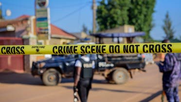 Police secure a road leading to the scene of an explosion in the Komamboga suburb of the capital Kampala, Uganda, on Oct. 24, 2021. (AP)