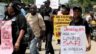 Journalists carry placards along a street during a protest to mark World Press Freedom day in Nigeria's commercial capital Lagos. (File photo: Reuters)