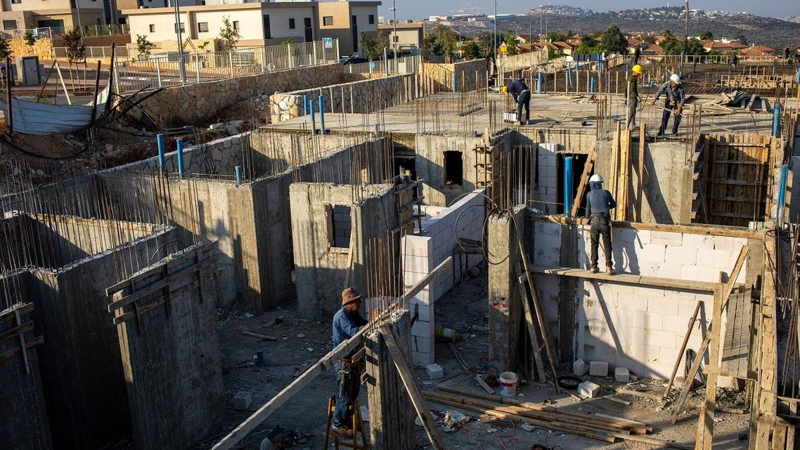 Palestinians built new houses in the West Bank Jewish settlement of Bruchin near the Palestinian town of Nablus, Monday, Oct. 25, 2021. (AP)