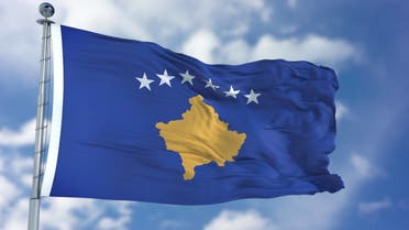 Kosovo Flag in a Blue Sky stock photo