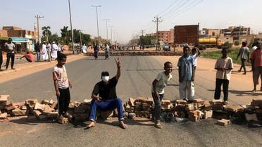 Protesters block a road during what the information ministry calls a military coup in Khartoum, on October 25, 2021. (Reuters)