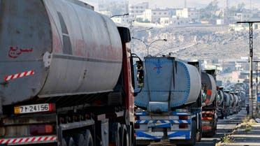 Tanker trucks form a queue as they wait to unload crude oil at Jordan Petroleum Refinery in the city of Zarqa, 25 km (15 miles) northeast of Amman. (Reuters)