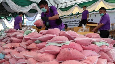 Thai narcotics officials arrange bags of methamphetamine pills during the 50th Destruction of Confiscated Narcotics ceremony in Ayutthaya province, Thailand, June 26, 2020. (File photo: Reuters)