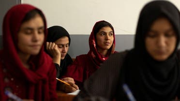 Girls attend lessons at their orphanage in Kabul, Afghanistan, October 10, 2021. (Reuters)
