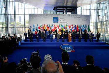 World leaders pose for a group photo at the La Nuvola conference center for the G20 summit in Rome, Saturday, Oct. 30, 2021. The two-day Group of 20 summit is the first in-person gathering of leaders of the world's biggest economies since the COVID-19 pandemic started. (AP)