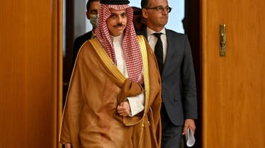 Saudi Foreign Minister Prince Faisal bin Farhan arrives with German Foreign Minister Heiko Maas for a joint news conference in Berlin. (Reuters)