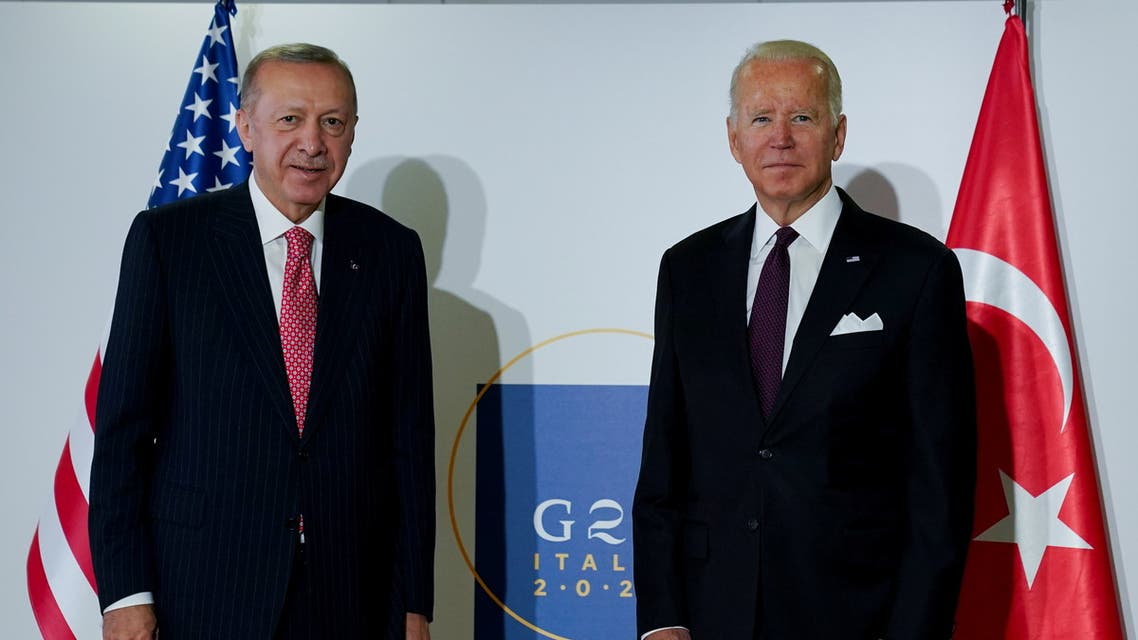 U.S. President Joe Biden and Turkey's President Tayyip Erdogan pose for a photo as they attend a bilateral meeting, on the sidelines of the G20 leaders' summit in Rome, Italy October 31, 2021. (Reuters)