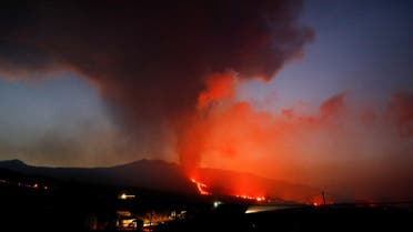 The Cumbre Vieja volcano spews lava and smoke while it continues to erupt, as seen from El Paso, on the Canary Island of La Palma, Spain, October 31, 2021. REUTERS/Borja Suarez