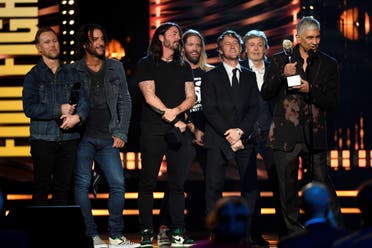 Foo Fighters are inducted into the Rock and Roll Hall of Fame by Paul McCartney, in Cleveland, Ohio, U.S. October 30, 2021. REUTERS/Gaelen Morse